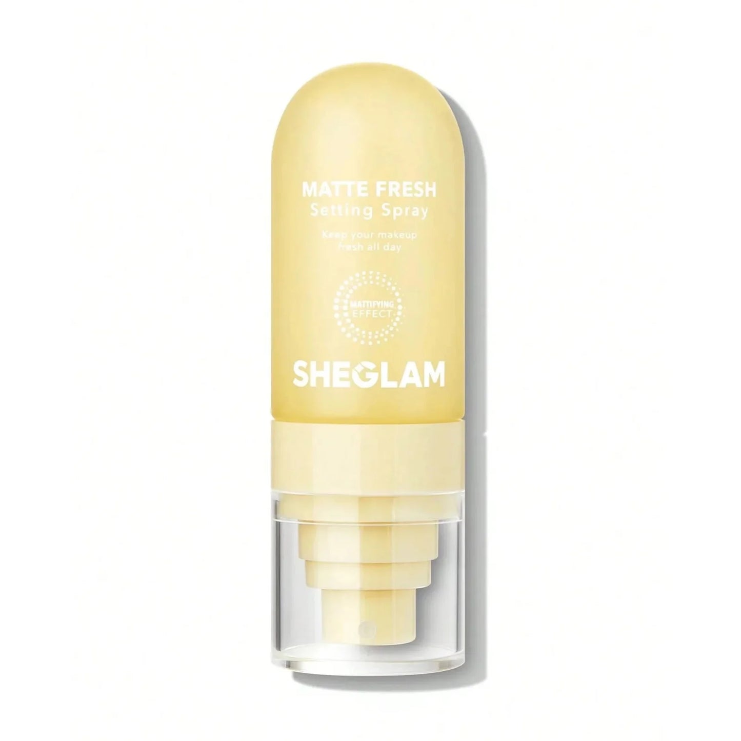 Spray fijador de maquillaje en tono amarillo/crema.