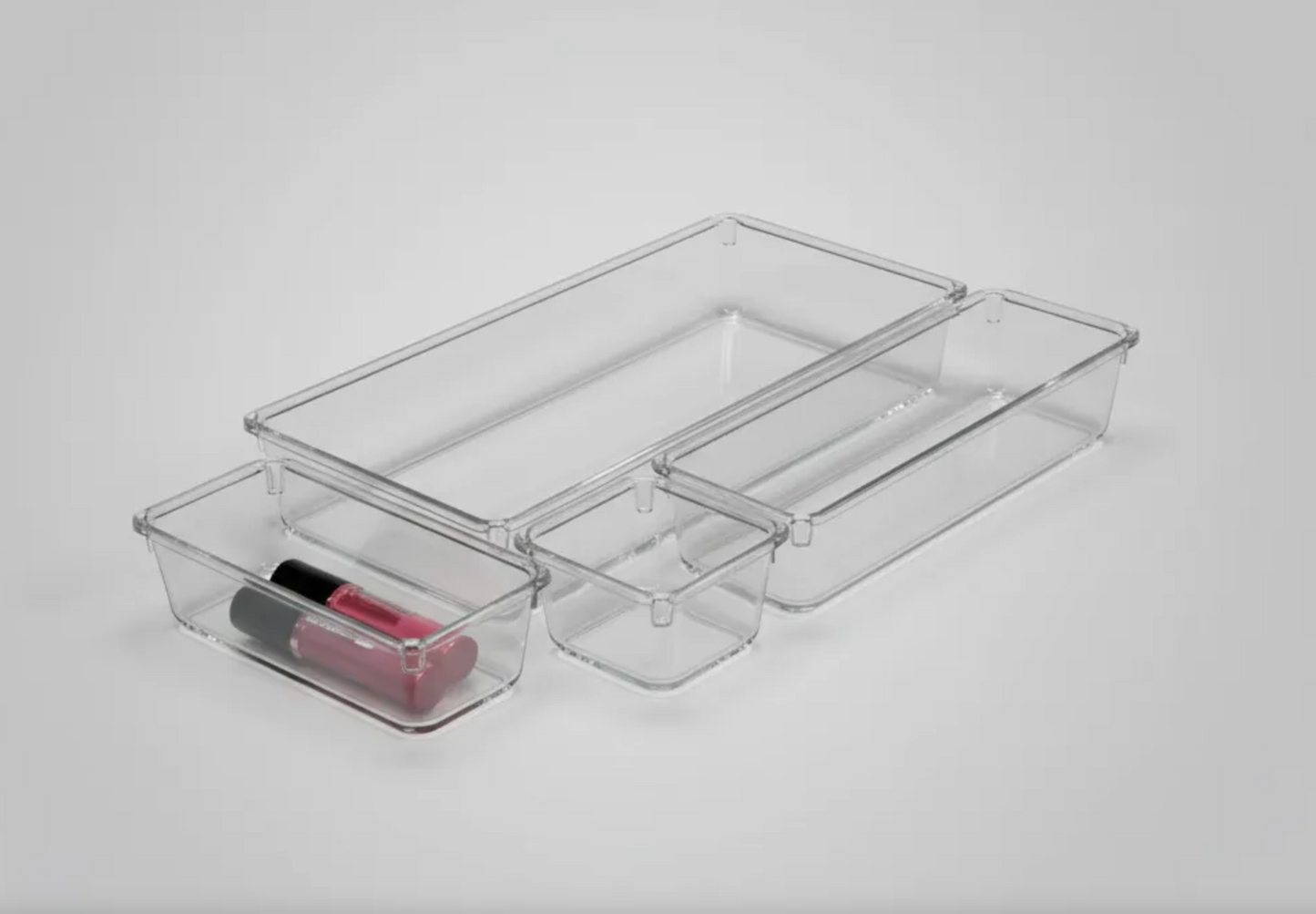 Set organizador de cajones de acrílico transparente multiusos con compartimentos modulares.