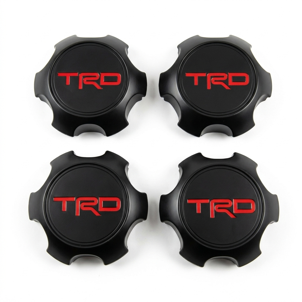 Set de tapas central de ruedas en acabado negro mate y logotipo TRD rojo, compatible con modelos Tacoma, 4Runner y FJ Cruiser.