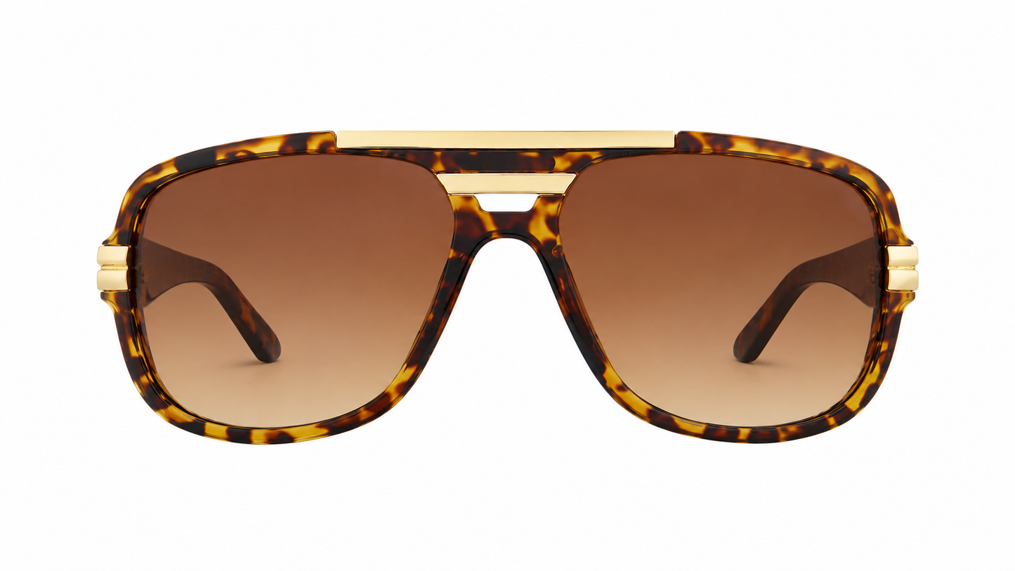 Lentes de sol estilo aviador con montura carey, detalles dorados y lentes marrones.