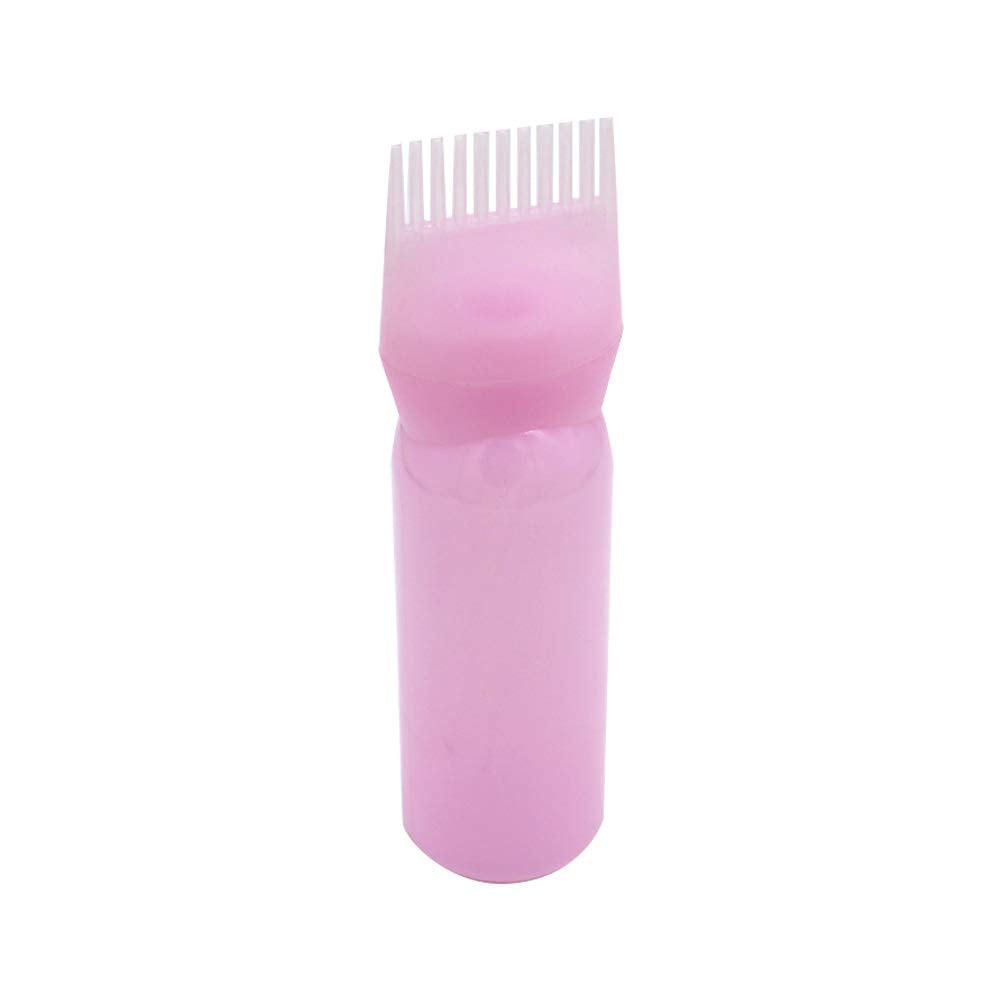 Botella aplicadora de tinte para el cabello con cepillo de peine en color rosa.