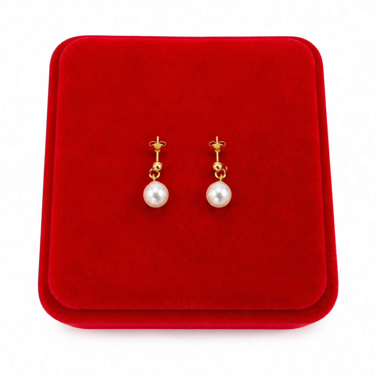 Aretes Colgantes con Perla Sintética Blanca y Acabado Dorado.