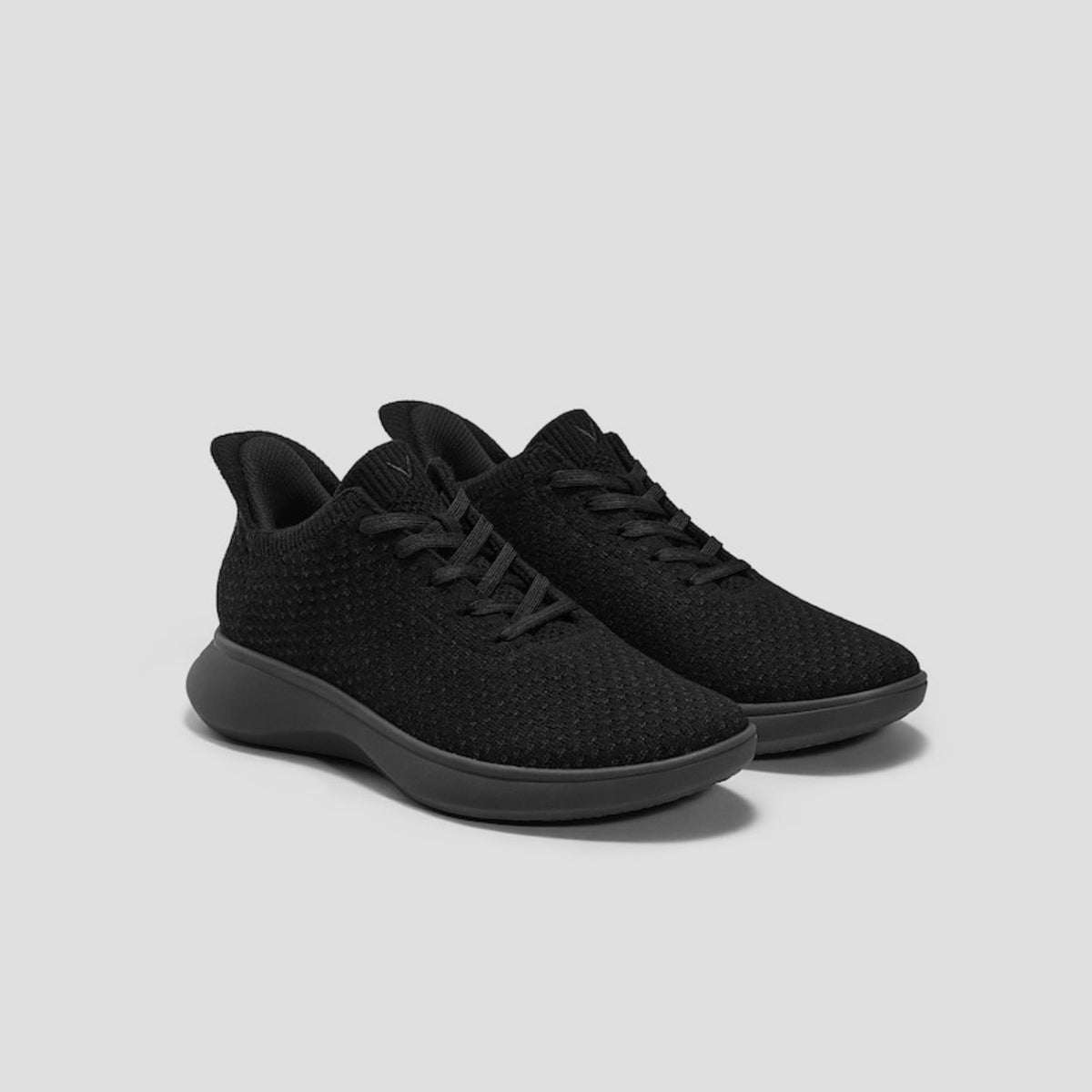 Tenis deportivos negros de tejido transpirable con cordones, talla 42.