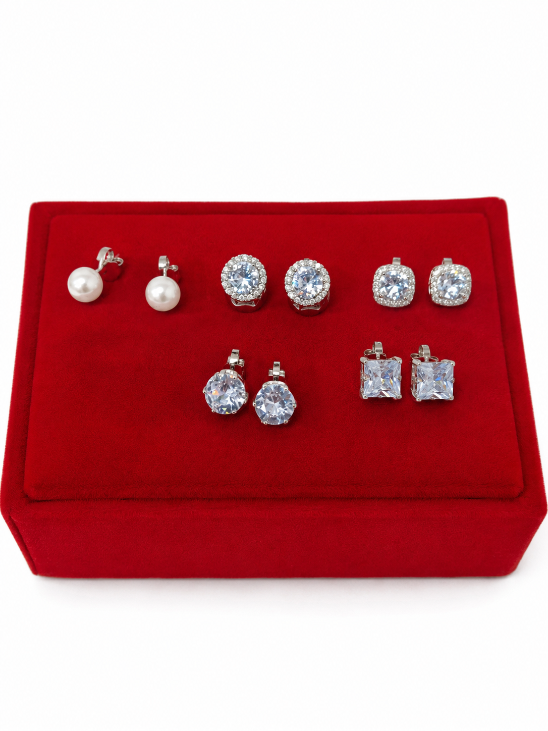 Set de 5 Pares de Aretes con Perla y Cristal Transparente en Color Plateado.