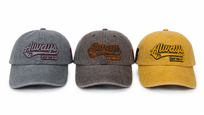 Juego de gorras casuales con visera curva en colores gris, gris oscuro y mostaza.