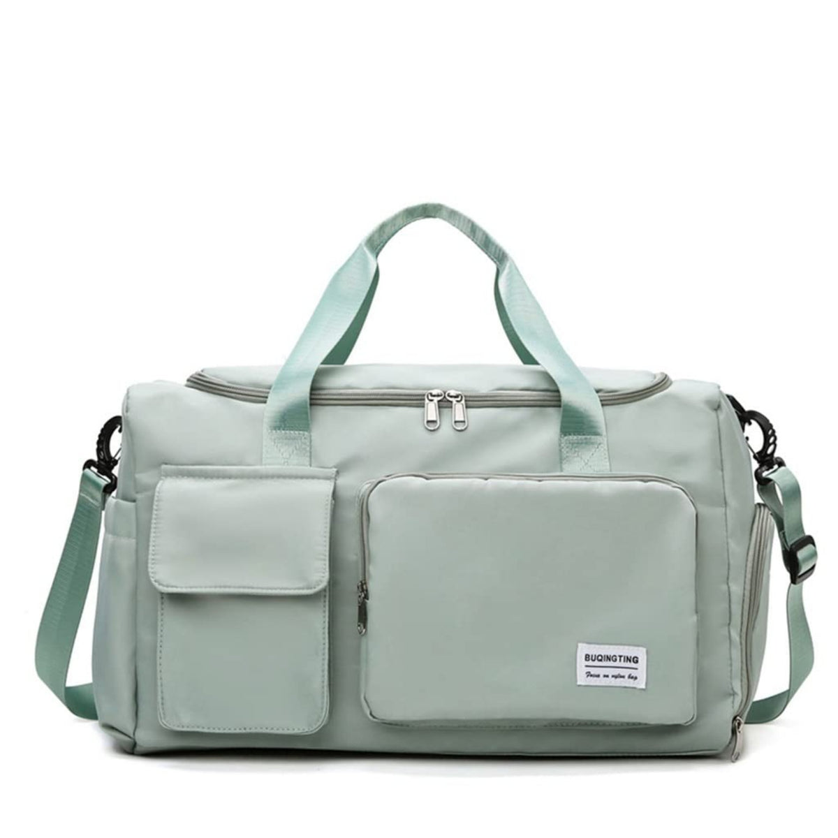 Bolso de viaje verde claro con múltiples bolsillos y correa ajustable.
