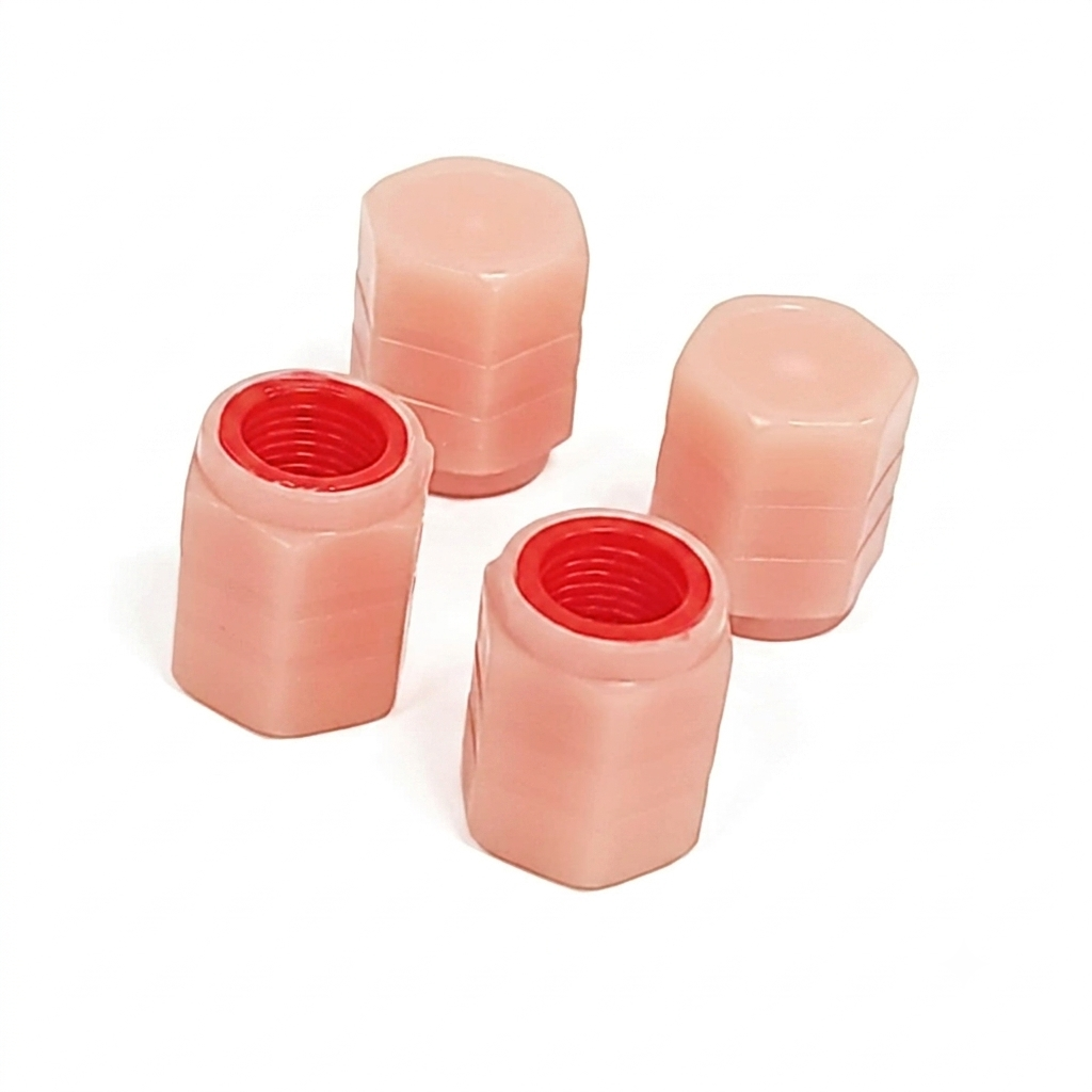 Tapones de válvula luminosos color rosa.