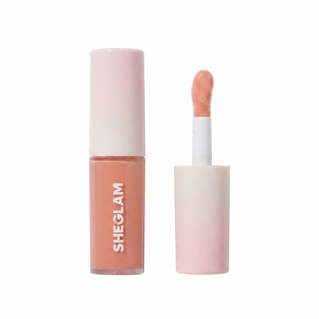 Brillo labial voluminizado Hot Goss en un tono rosado suave.