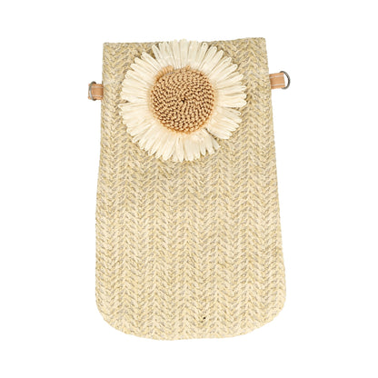 bolso bandolera de paja con una flor de margarita bordada.