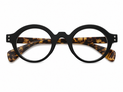 Gafas Ópticas Redondas con Lentes Transparentes, Montura Negra y Patillas Estampadas.
