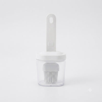 Botella dispensadora de aceite blanca 2 en 1 cuenta con un cepillo de silicona integrado para cocinar o hacer barbacoas.