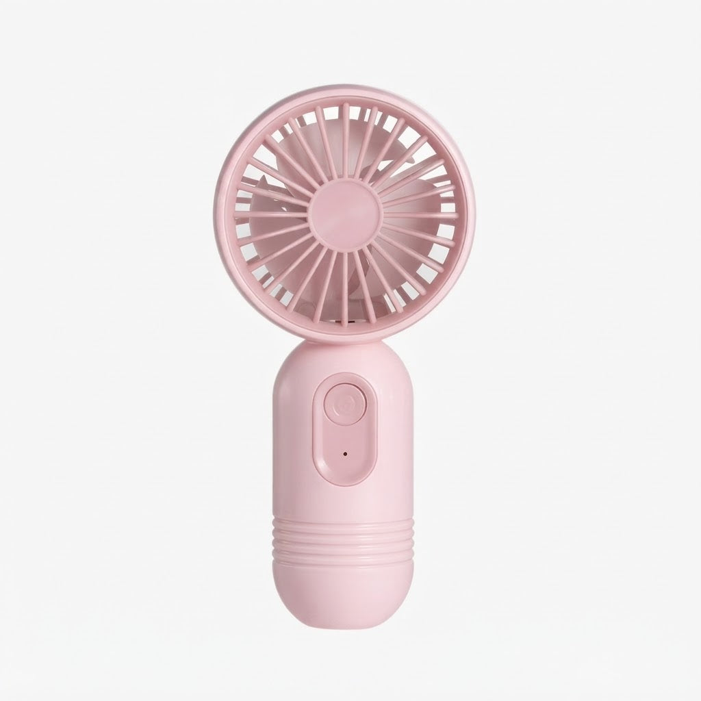 Mini ventilador portátil de mano de color rosa.