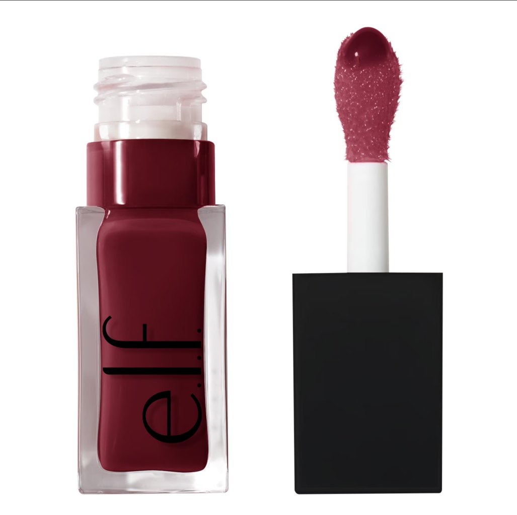 Aceite labial nutritivoen en tono rojo brillante con un aplicador de felpa acolchado.