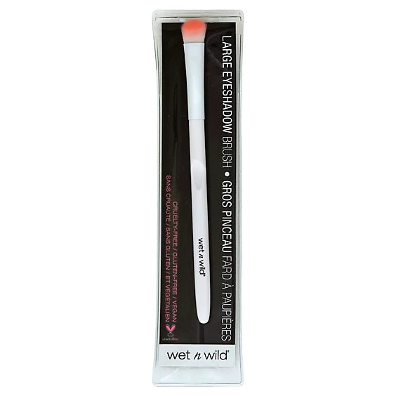 Brocha para difuminar sombras de ojos, modelo E787 Crease Brush, caracterizada por sus cerdas sintéticas blancas con puntas rosadas y mango ergonómico blanco.