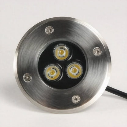 Luminaria LED empotrable de acero inoxidable diseñada para iluminación subacuática o de suelo en exteriores.