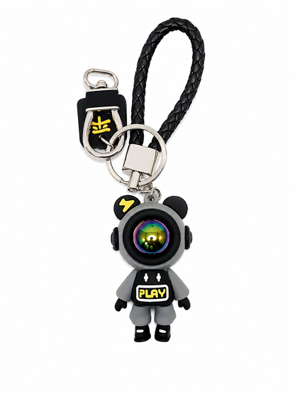 Llavero Colgante con Figura de Robot Espacial y Correa Trenzada Negra.