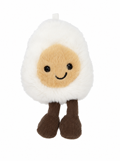 Peluche decorativo con diseño de huevo sonriente de felpa suave.