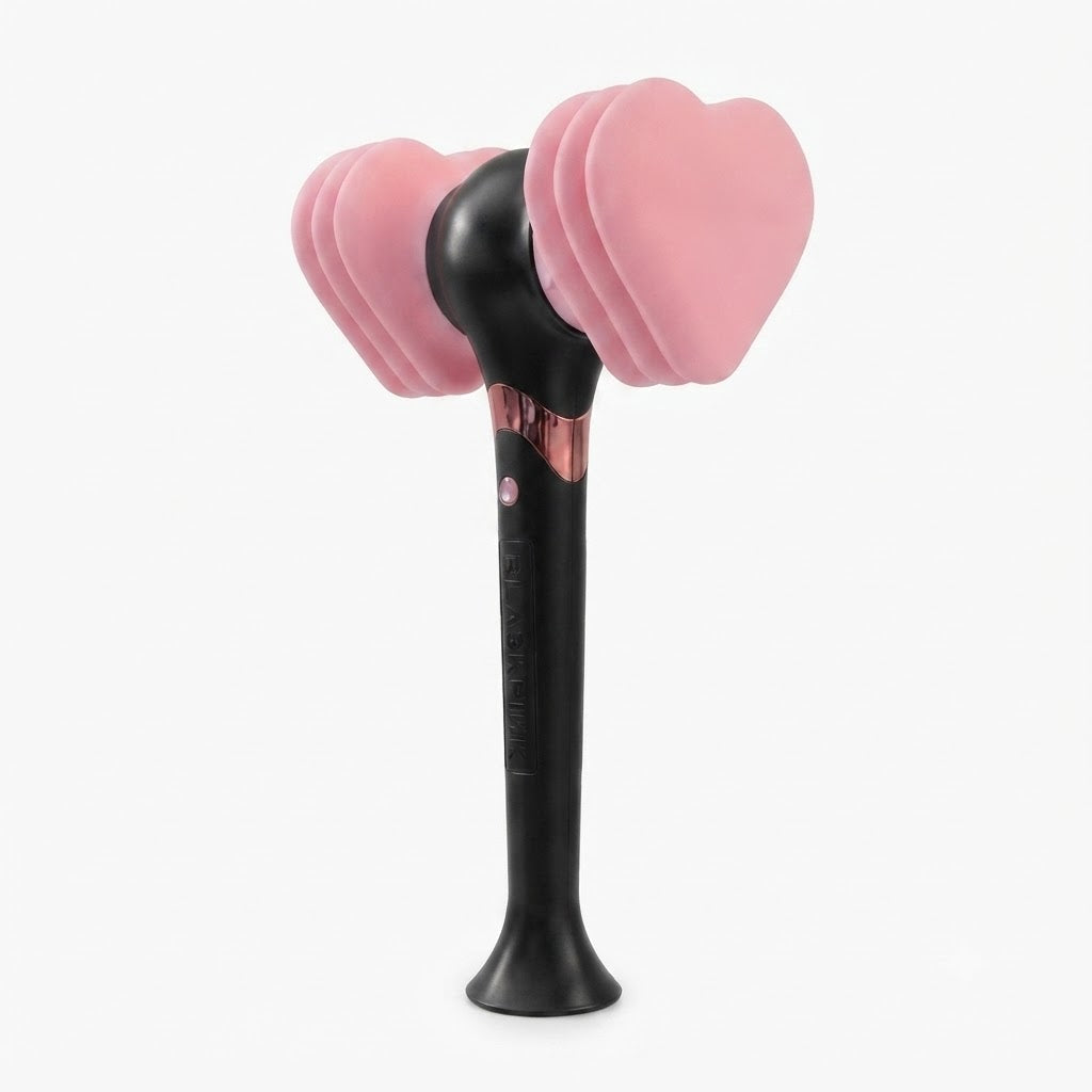 Dispositivo de iluminación para fans con forma de martillo de goma rosa y negro.