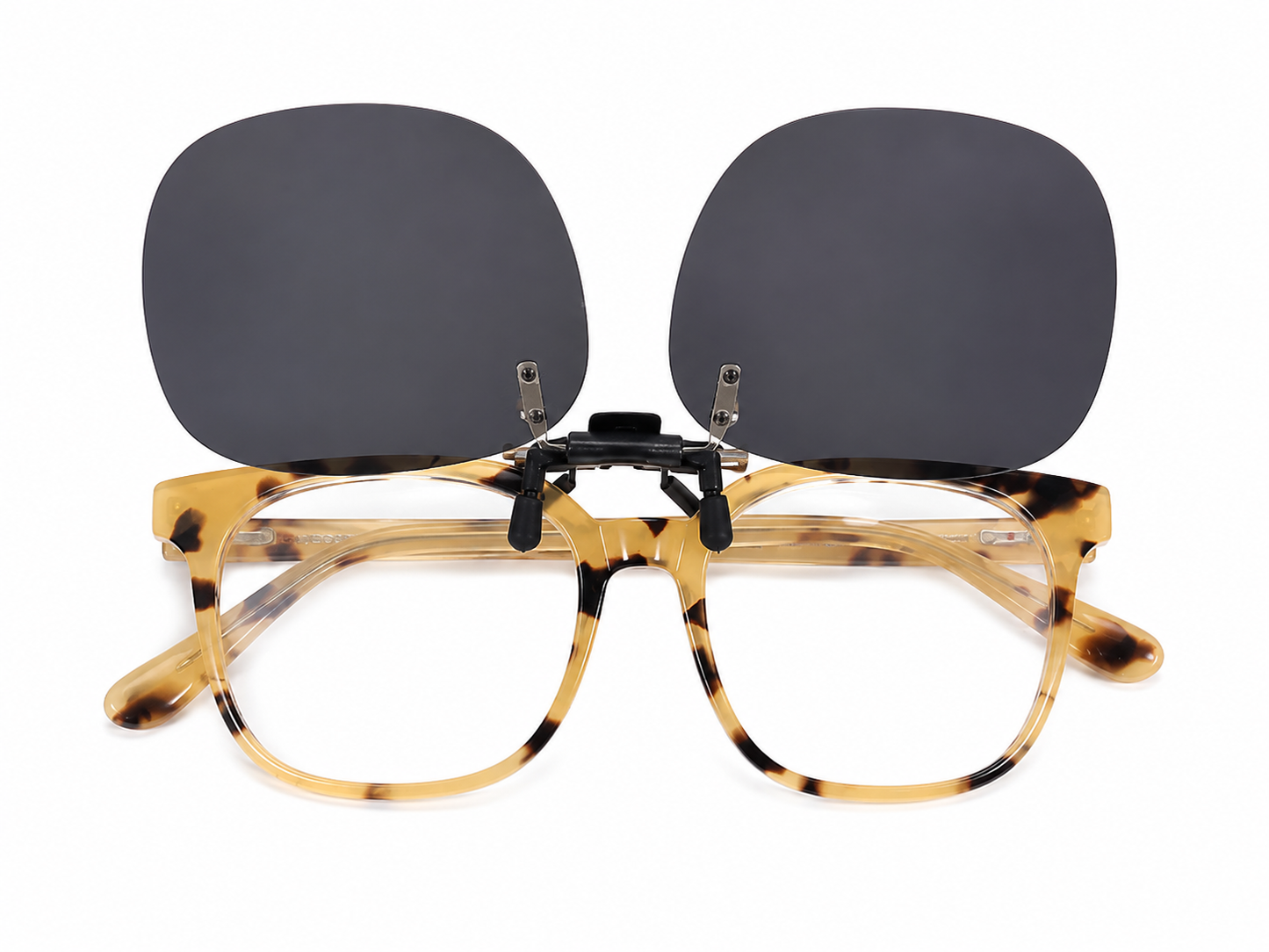 Gafas con lentes transparentes y clip magnético de lentes oscuros color carey.