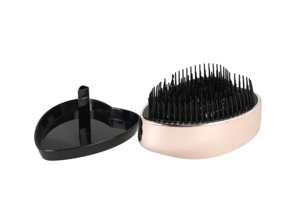 Cepillo ReFa Heart color oro rosa.