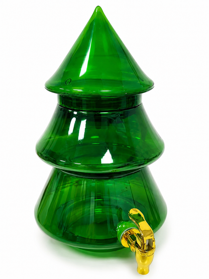 Dispensador de bebidas transparente con diseño de árbol navideño y grifo dorado.