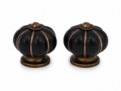 Perillas decorativas redondas para muebles, juego de 2 piezas en acabado negro con detalles bronce.