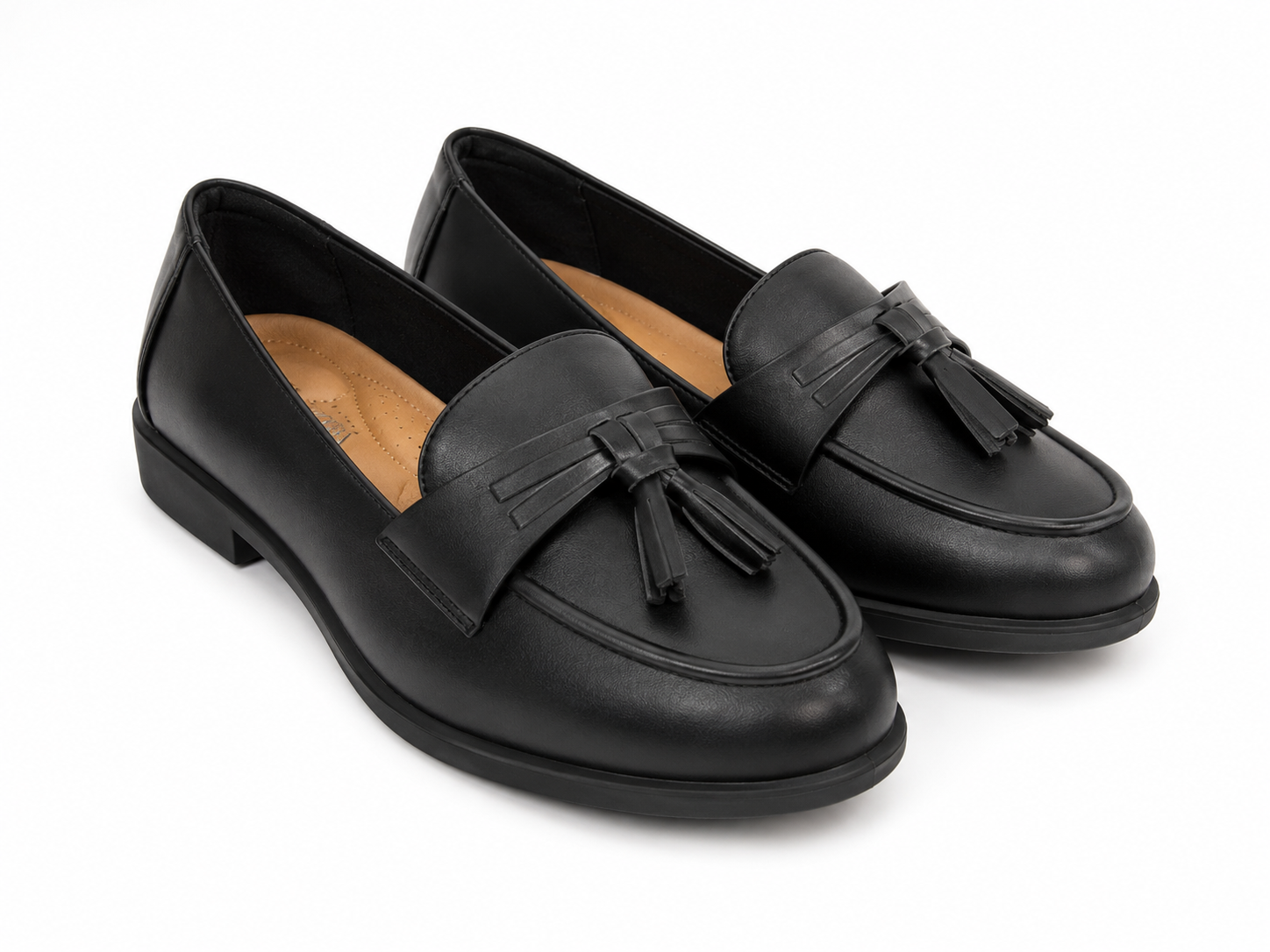 Mocasines negros con borlas decorativas y tacón bajo, talla 7.5.