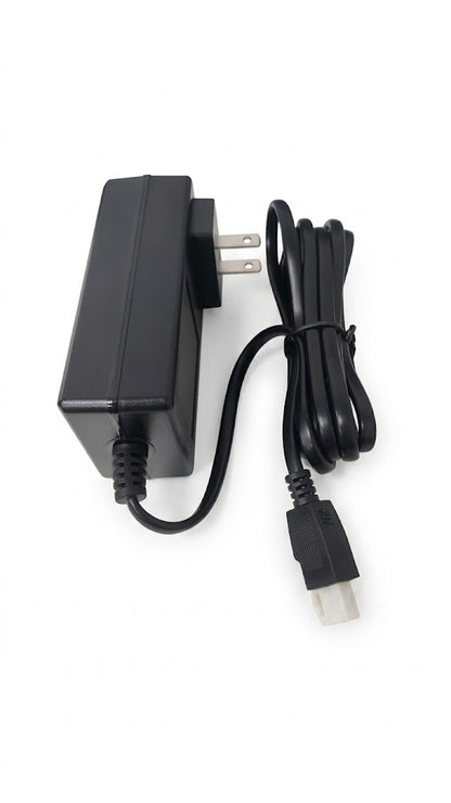 Adaptador de corriente alterna (CA) a corriente continua (CC).