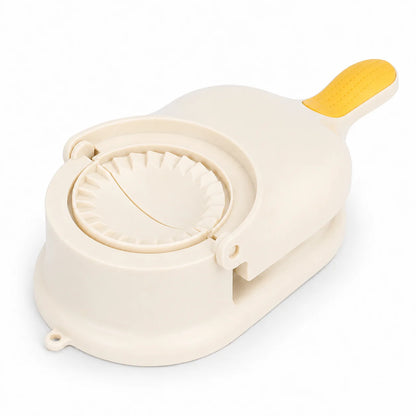 Herramienta de cocina 2 en 1 funciona tanto para presionar la masa como para sellar empanadillas o dumplings.