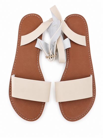 Sandalias Planas para Mujer Color Beige con Tiras para Amarre Talla 39.
