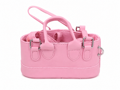 Bolso de mano pequeño color rosa con asas dobles y correa ajustable desmontable.