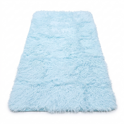 Alfombra peluda de color azul claro para brindar suavidad y calidez a cualquier espacio interior 129 x 67 cm