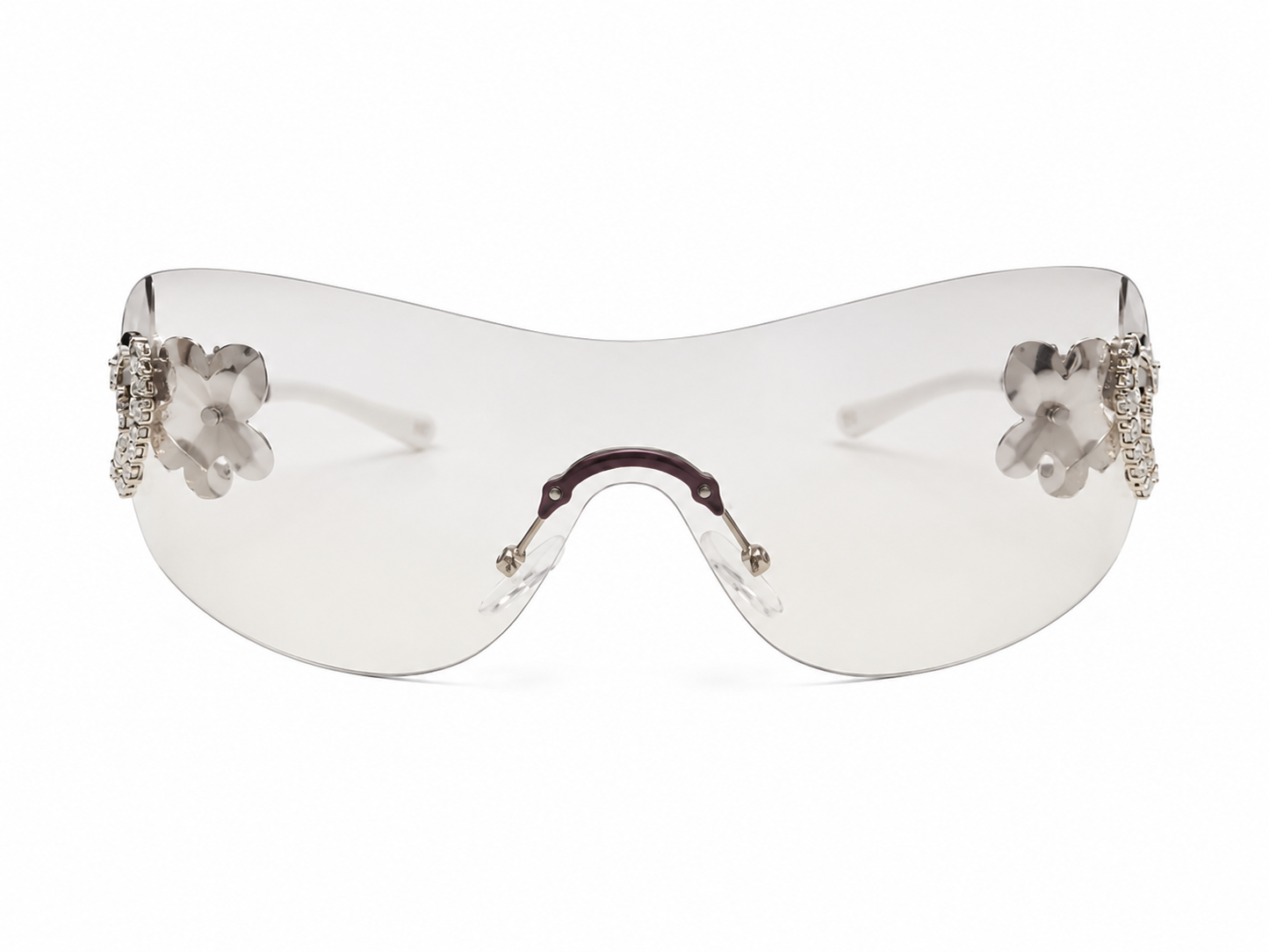 Gafas de sol tipo visor con diseño floral transparente.
