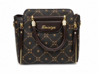 Bolso de mano marrón con estampado decorativo, asas y herrajes dorados.