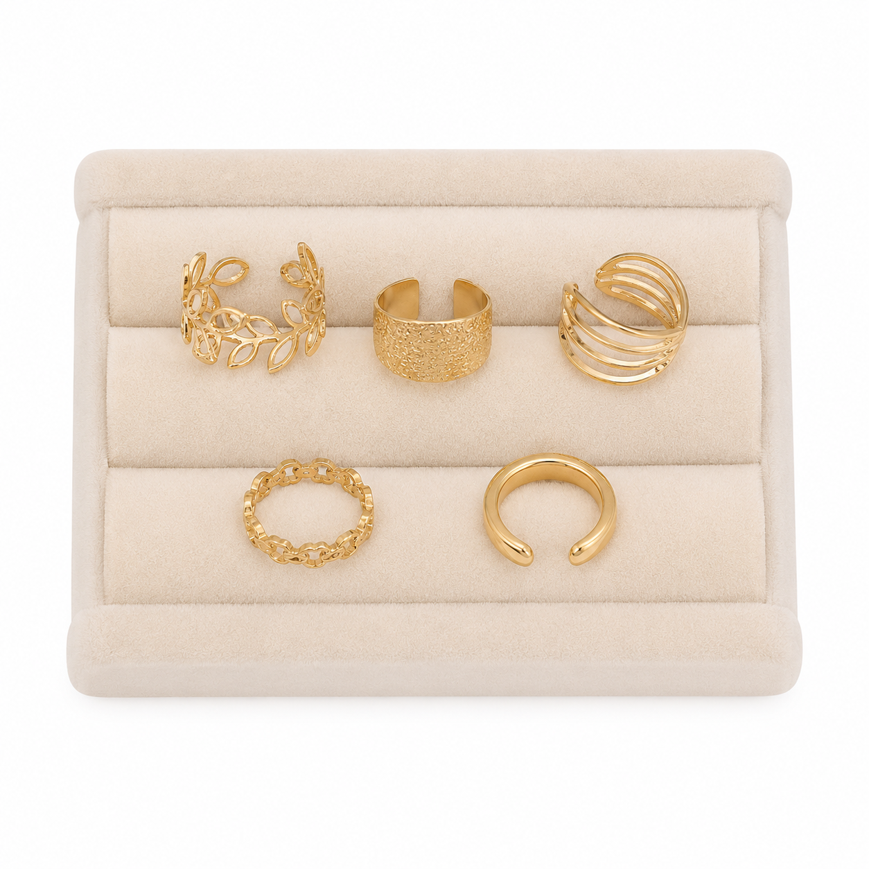 Set de anillos ajustables pequeños color dorado con diseños variados.