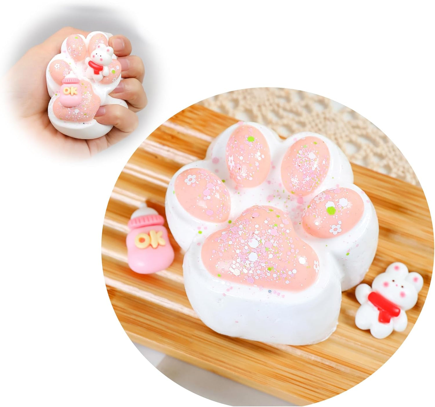 Juguete antiestrés  con forma de pata de gato rosa y blanca.