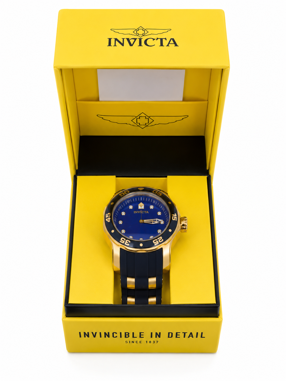 Reloj analógico de pulsera con esfera azul, correa bicolor y estuche de presentación.