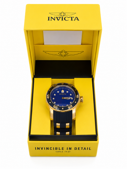 Reloj analógico de pulsera con esfera azul, correa bicolor y estuche de presentación.
