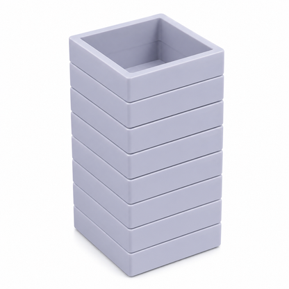 Juego de cajas organizadoras apilables gris claro para joyería y colecciones.