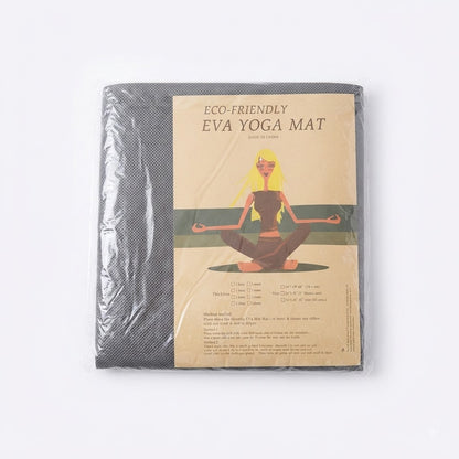 Tapete de yoga ecológico de material EVA de color negro.