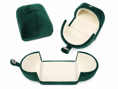 Estuche compacto para anillo color verde con interior acolchado para exhibición y regalo.