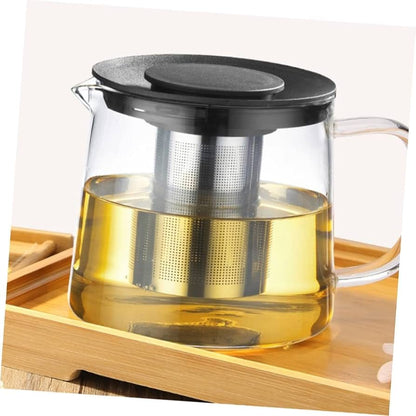 Tetera de vidrio con infusor de acero inoxidable y tapa negra para té.