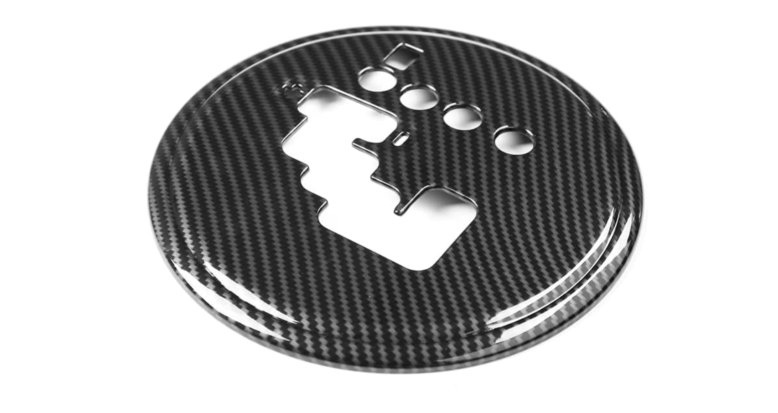 Cubierta adhesiva de fibra de carbono para el panel de cambios de un Mazda MX-5 NC.
