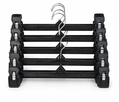 Juego de ganchos con clips para pantalones y faldas, color negro.