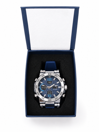 Reloj de pulsera azul y plateado con esfera multifunción y correa ajustable.