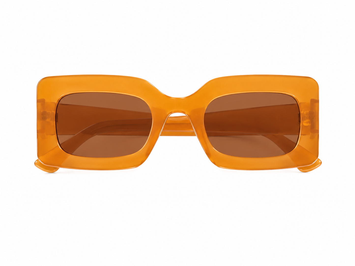 Gafas de sol rectangulares con montura translúcida color ámbar y lentes tintados para mujer.