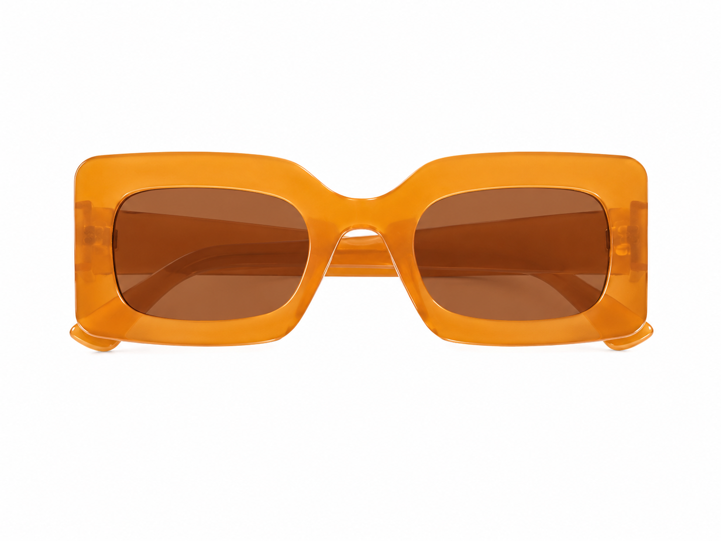 Gafas de sol rectangulares con montura translúcida color ámbar y lentes tintados para mujer.