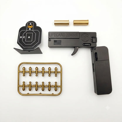 Kit de una pistola de juguete estilo derringer que expulsa casquillos.