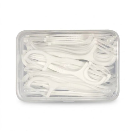 Palillos de hilo dental, comúnmente utilizados para remover placa y residuos de comida entre los dientes.