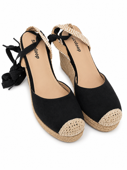 Sandalias de plataforma con cuña, punta cerrada y cintas para amarre en color negro talla 39.